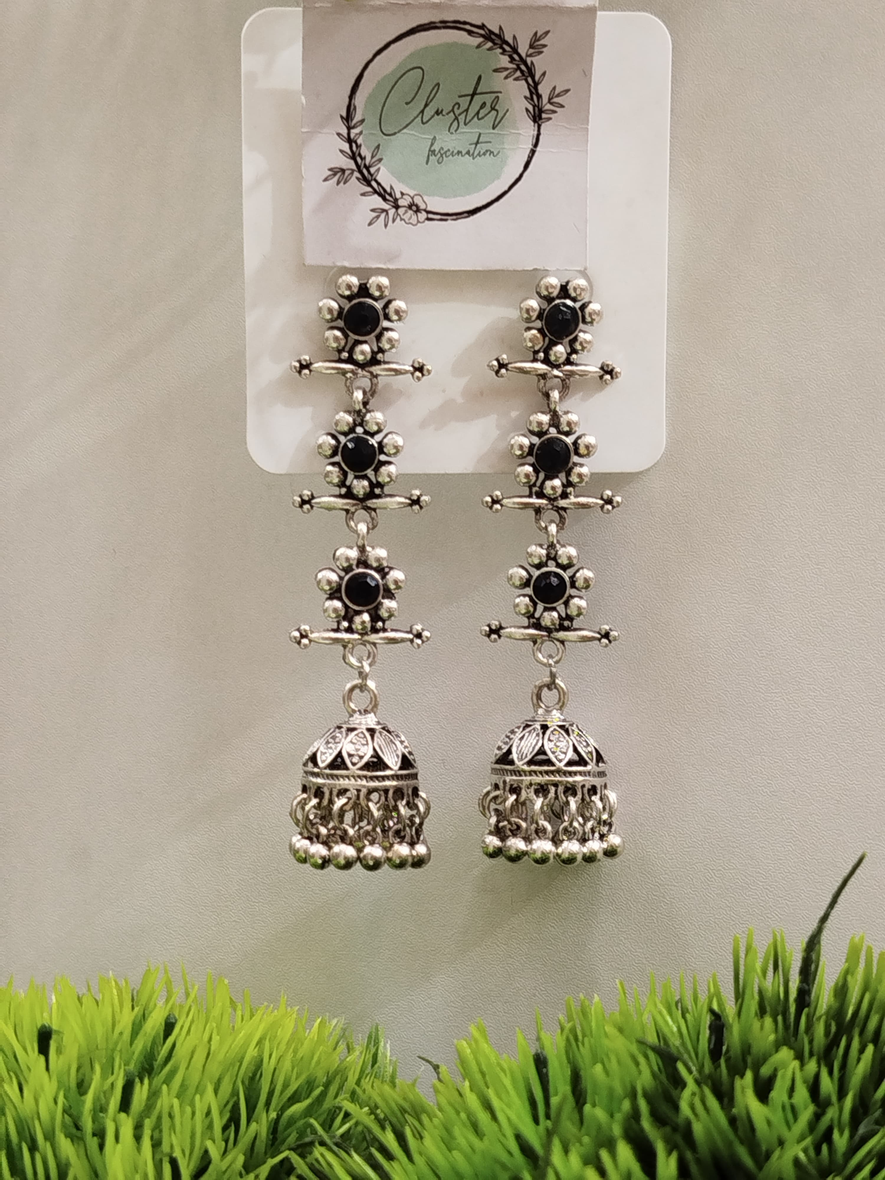 Antique Silver Plated Layered Jhumka With Stones 