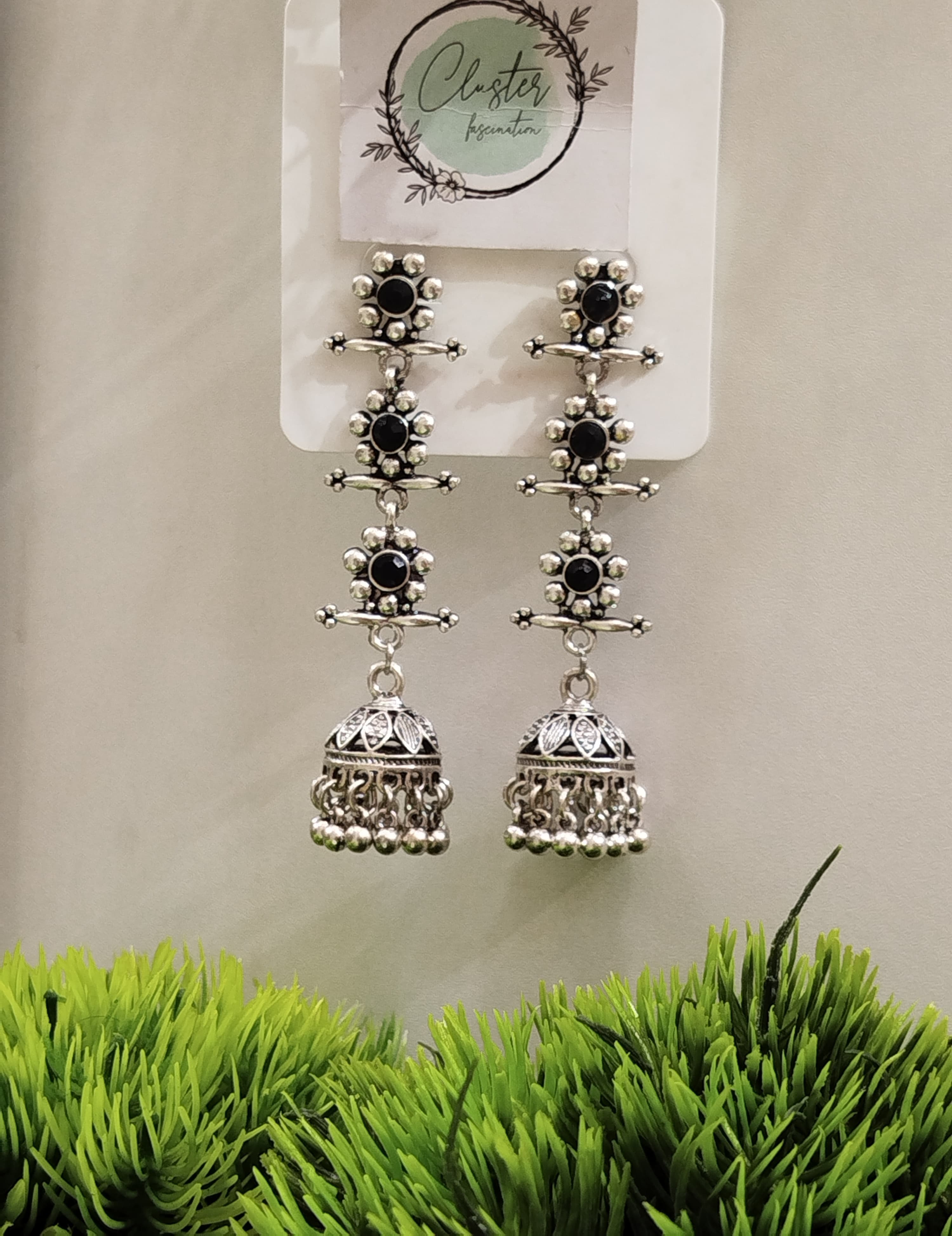 Antique Silver Plated Layered Jhumka With Stones 